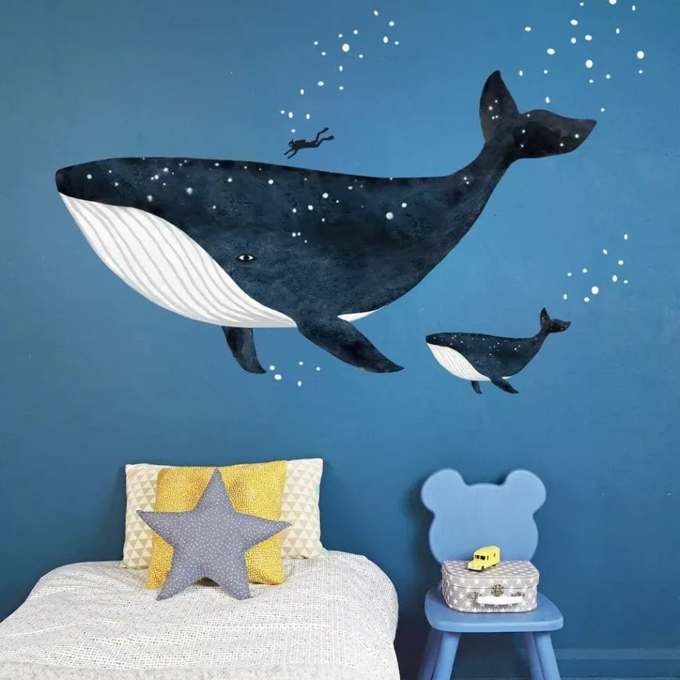 A blue whale and her calf together with a diver wall sticker.