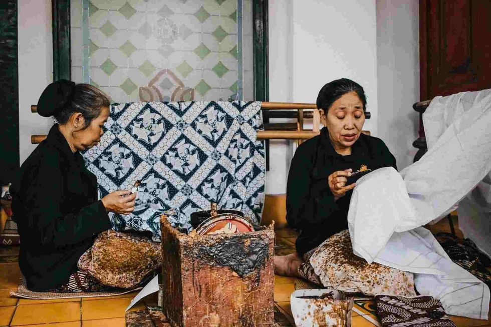 A copper tool called canting is used by batik craftswomen and craftsmen to create an intricate batik motif. Read for more mesmerizing Batik facts.