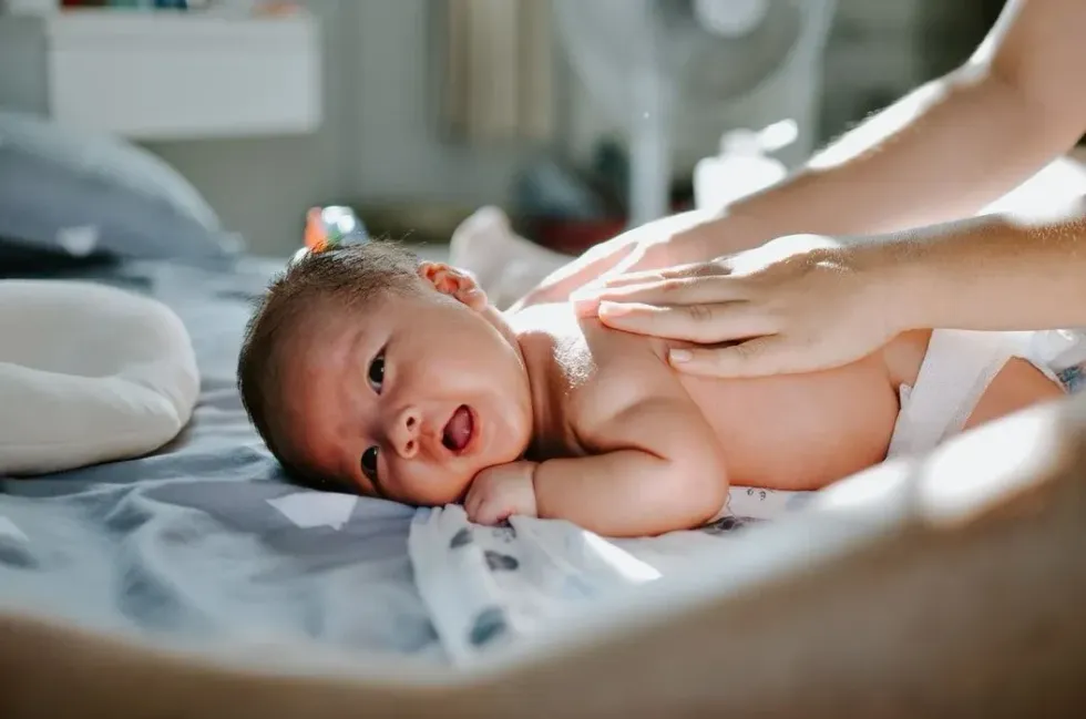 A family can benefit from a postpartum doula while they get to know their new infant.