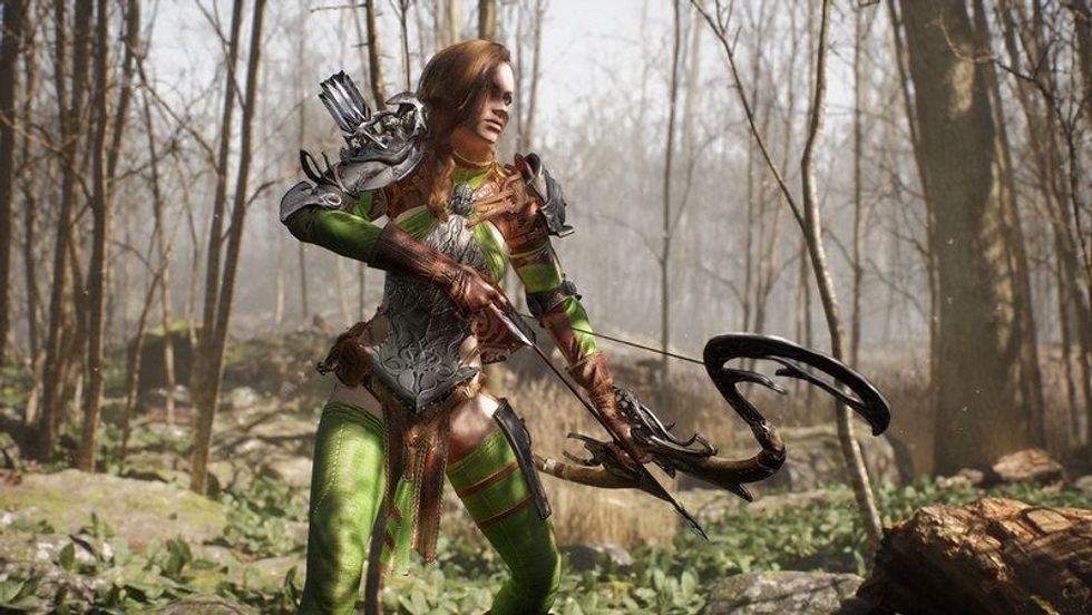 A female fictional character in the woods fixing an arrow in her bow.