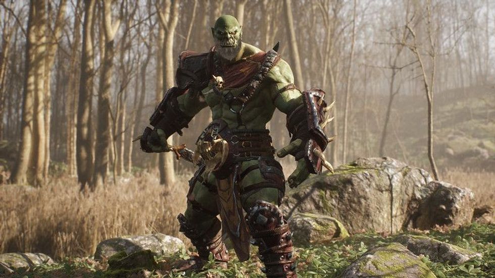 A formidable orc warrior trains before battle and demonstrates combat skills.