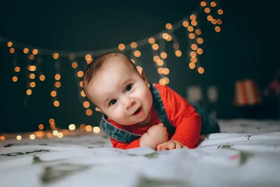 A happy newborn baby boy