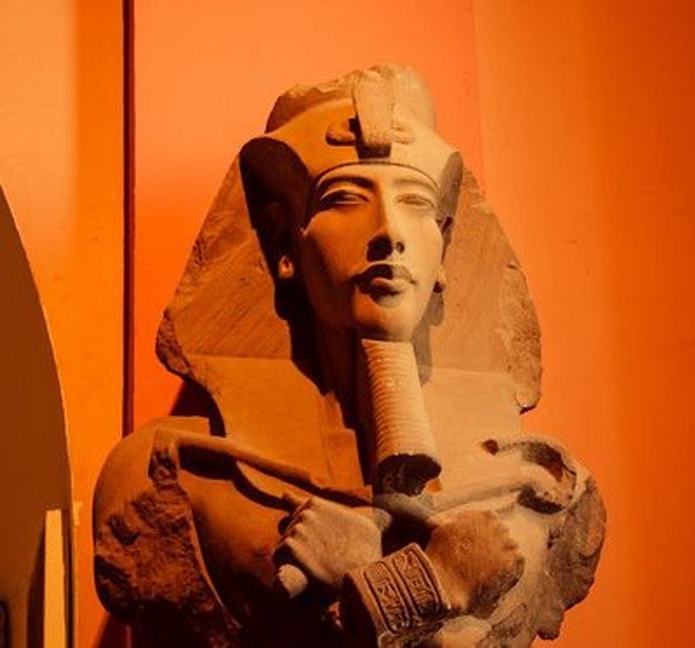 A head statue of Pharaoh Akhenaten