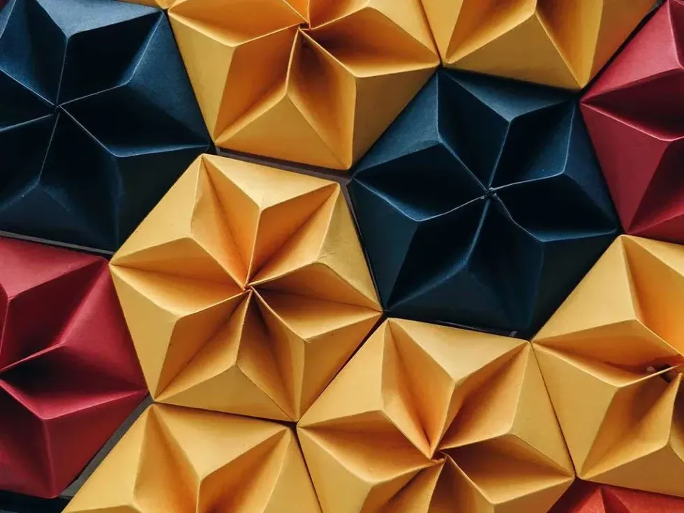 A hexagonal origami paper pattern.