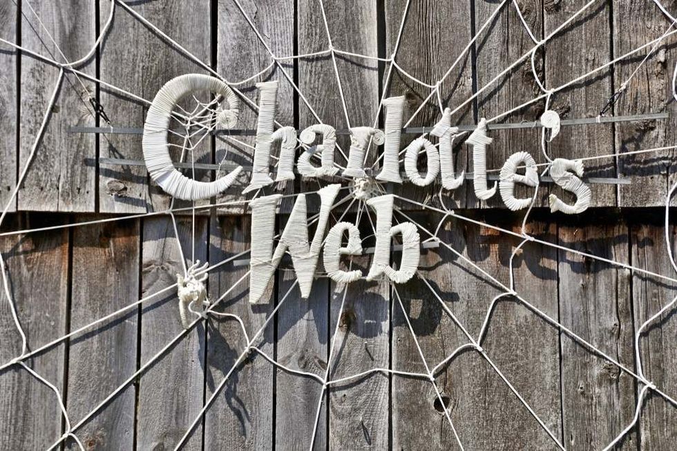 A horizontal image of the wall display for an upcoming performance of "Charlotte's Web" at historic Old Sturbridge Village.