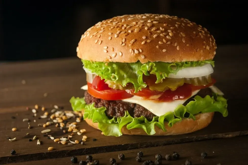A peek into the delicious burger. Read on to find out more such lip-smacking burger facts.
