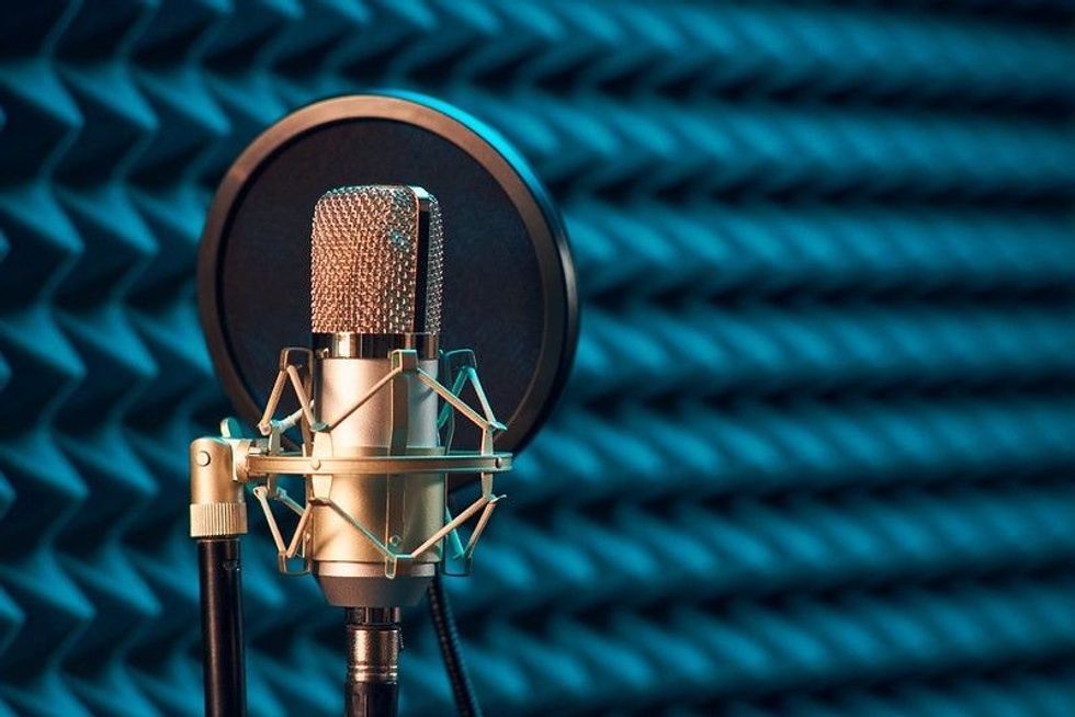 A playback mic in music studio with blue background