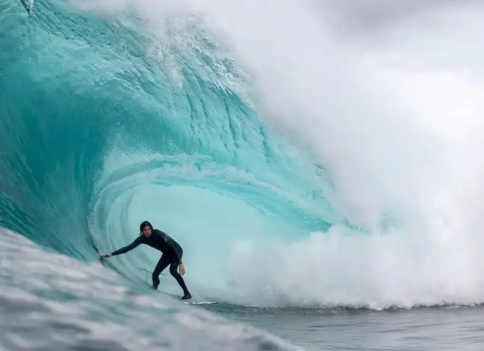 A surfer surfing on waves 