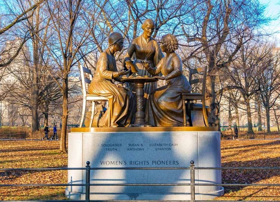 A view from Central Park showing a statue dedicated to Women's Rights pioneers Sojourner Truth, Susan B. Anthony and Elizabeth Cady Stanton.