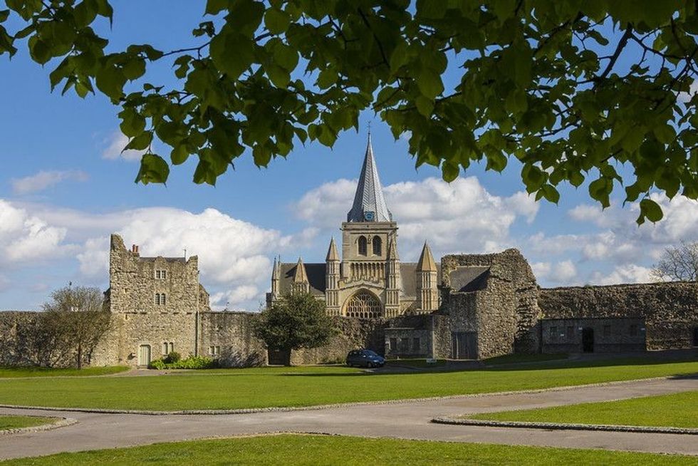A view of Rochester Cathedral from the grounds of Rochester Castle in the historic city of Rochester in Kent, UK
