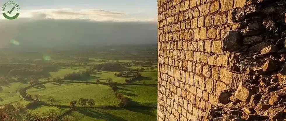 A view of the Cheshire Plain behind Beeston Castle and Woodland Park.