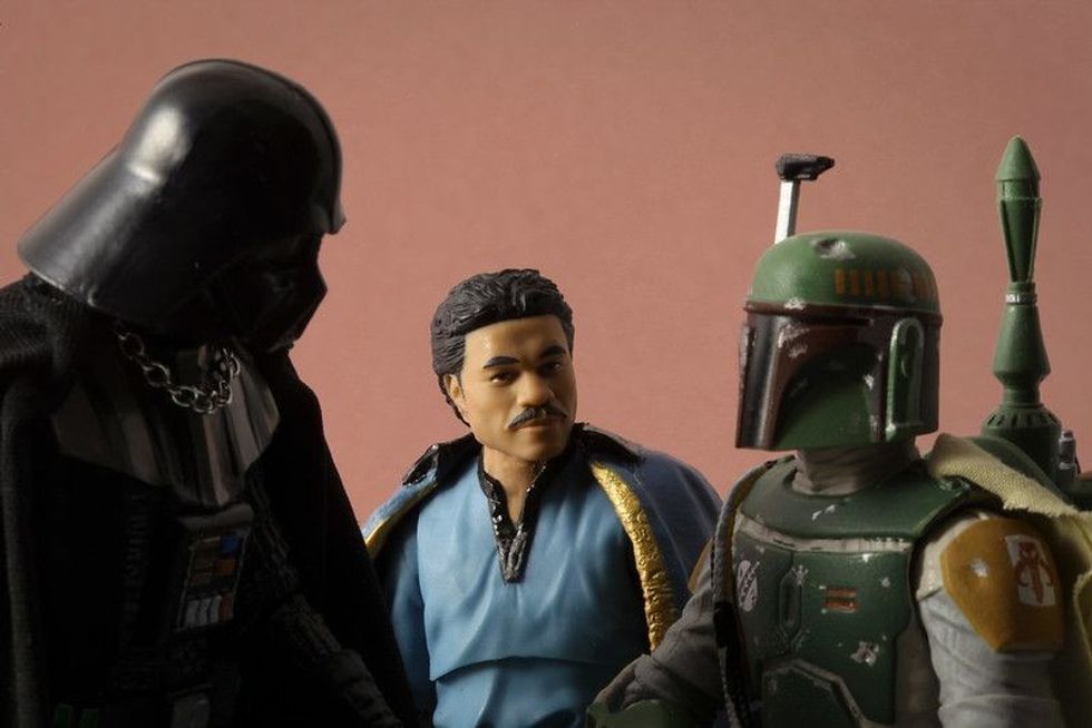 Action figurines of Boba Fett, Darth Vader,Lando Calrissian