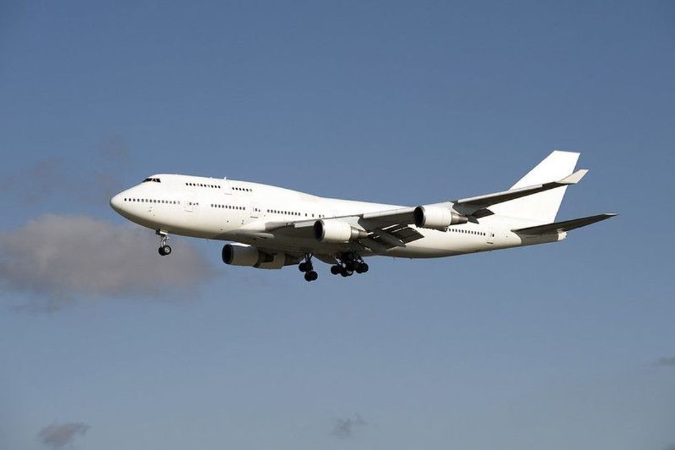 Airplane Boeing 747 launched in 1969 is flying in the sky