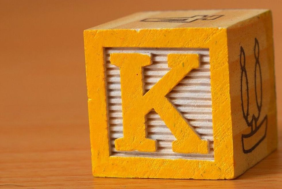 Alphabet block with the letter K