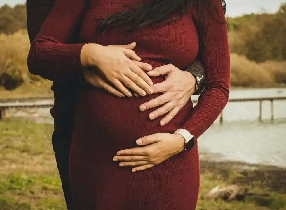 An ectopic pregnancy is when the fertilized egg implants outside of the uterus and can cause vaginal bleeding and require treatment.