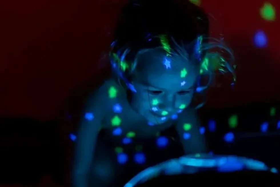 An image of a girl engulfed in an enchanting light