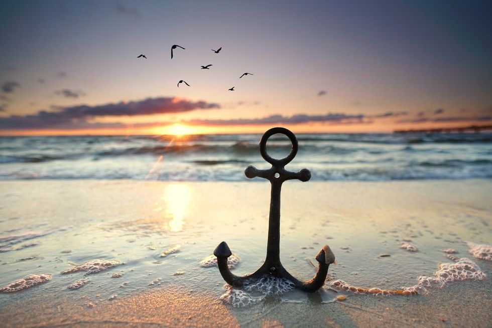 Anchor at the beach with sunset light.