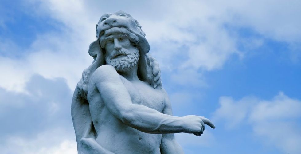 Ancient statue of Hercules (Heracles) is a Roman hero and god. 