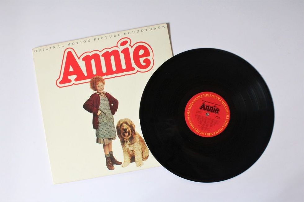 Annie movie poster with music album