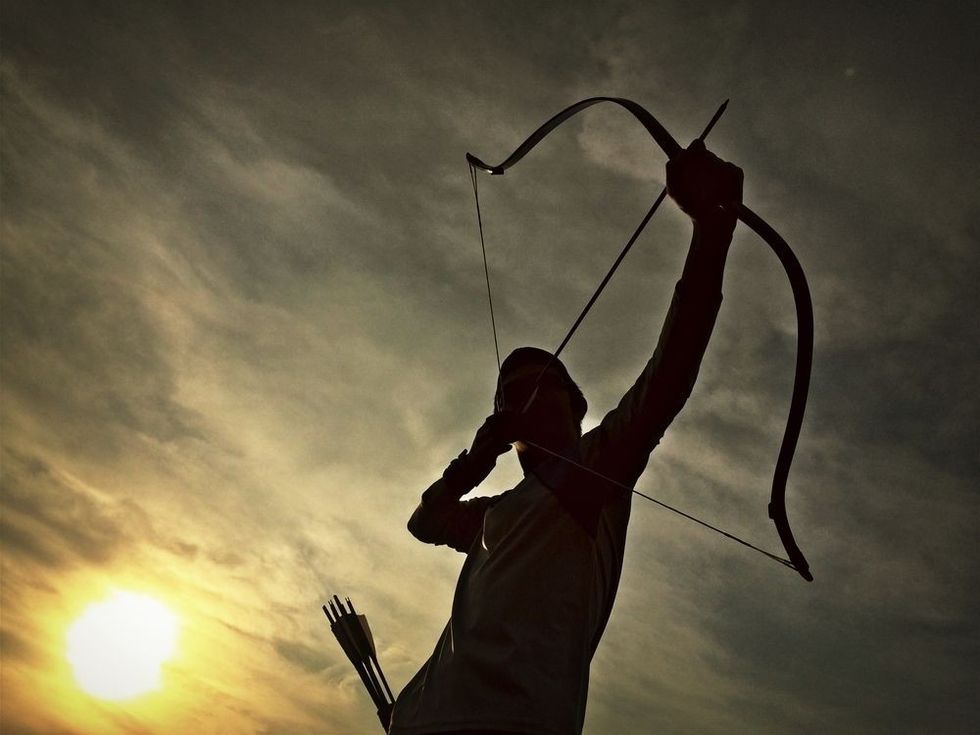 Archer silhouette during sunset