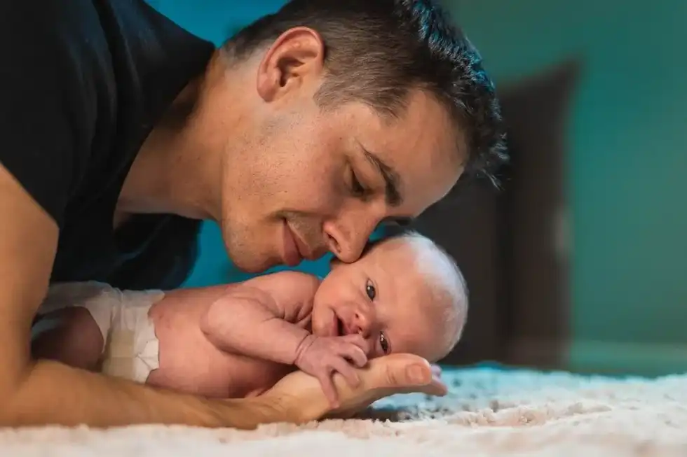 At three weeks old, you can start to introduce some closely supervised tummy time.