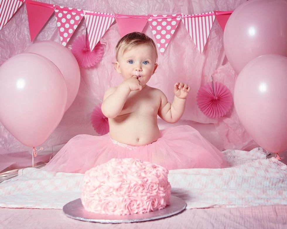Baby girl  in pink tutu skirt 