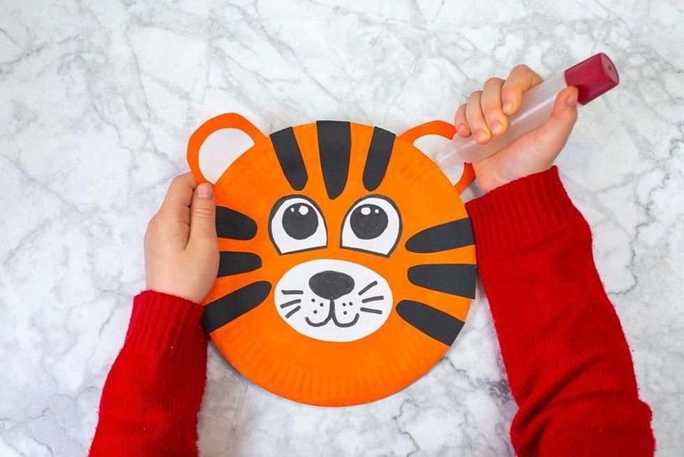 Baby making origami tiger