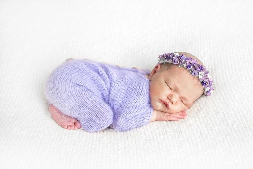 Baby sleepin wrapped in purple blanket - Nicknames