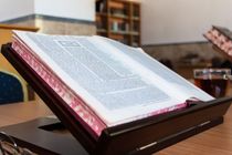 Background of Book of Talmud on Stand.