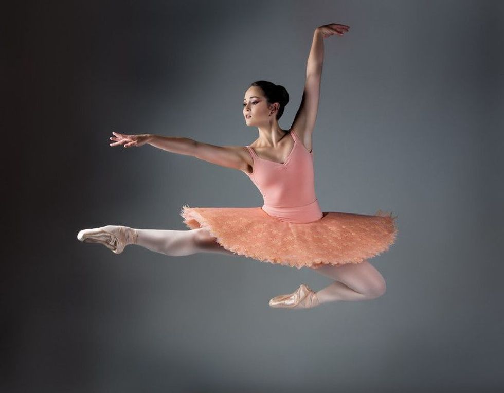 Ballet dancer in pink outfit