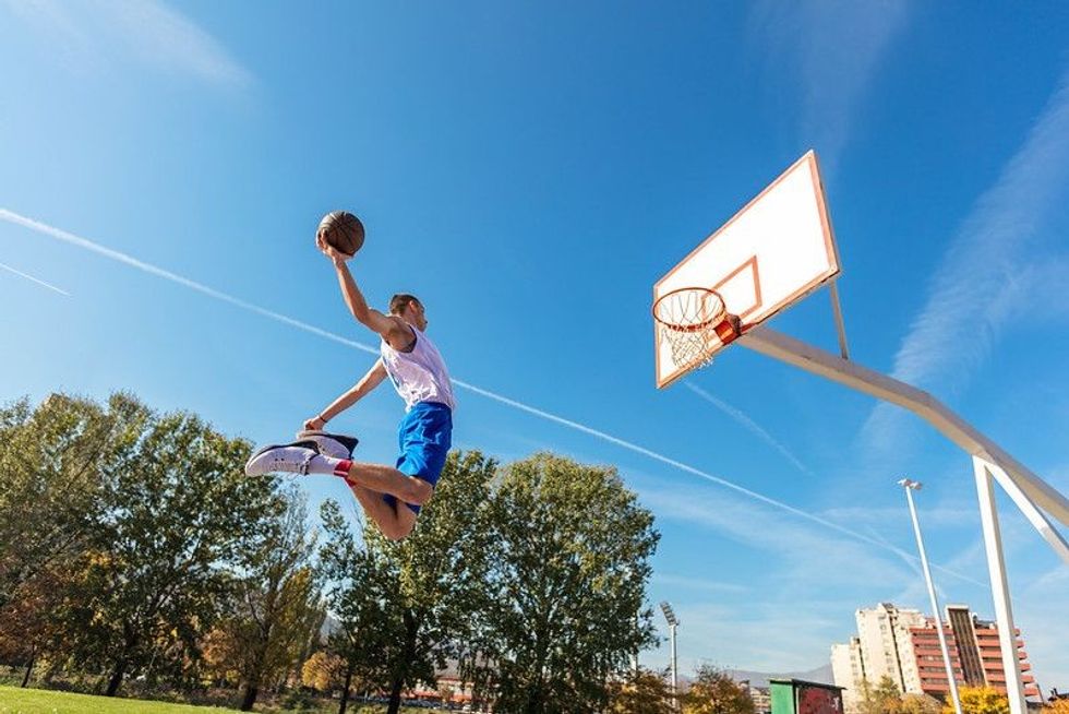 Basketball Player playing on the field.