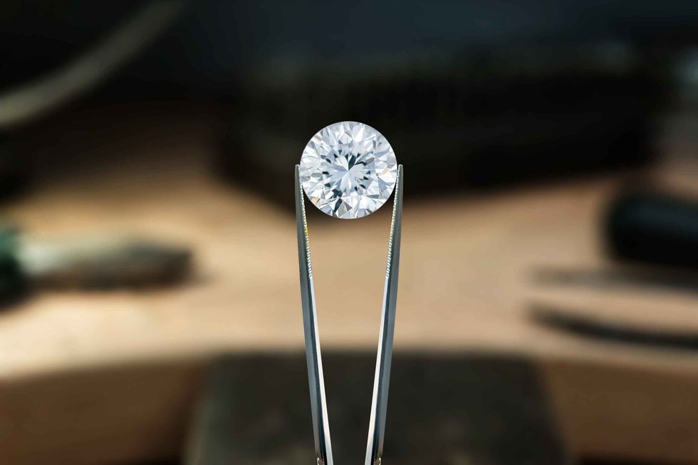 Beautiful diamond stone in tongs