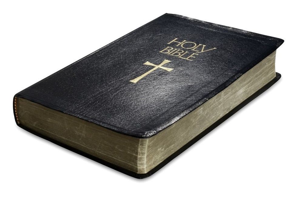 Bible on white with clipping path