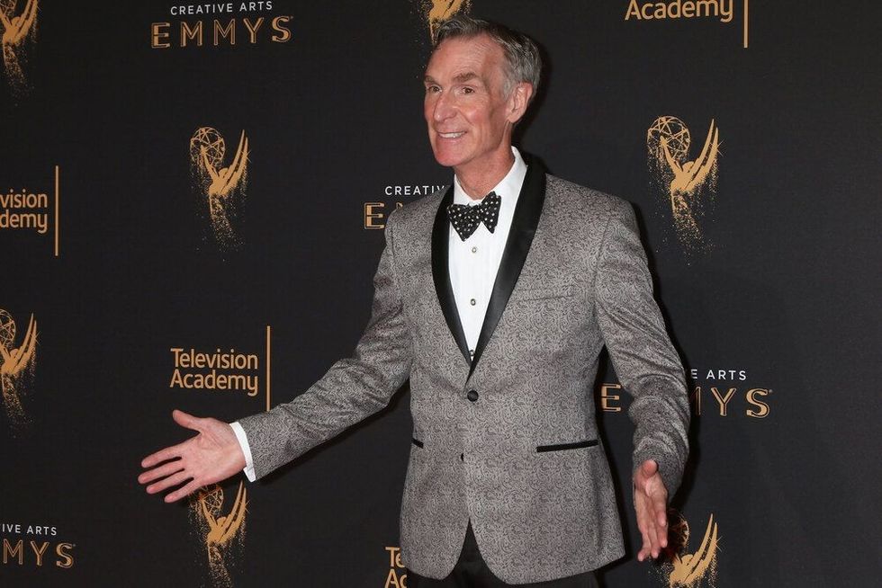 Bill Nye at the Emmy Awards posing for the cameras