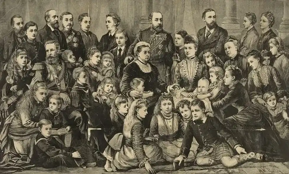 Black and white portrait of Queen Victoria and her large family surrounding her.