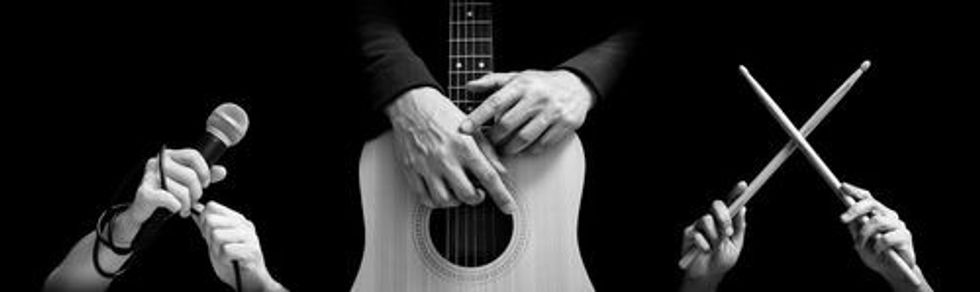 black and white singer, guitarist, drummer hands. isolated on black.