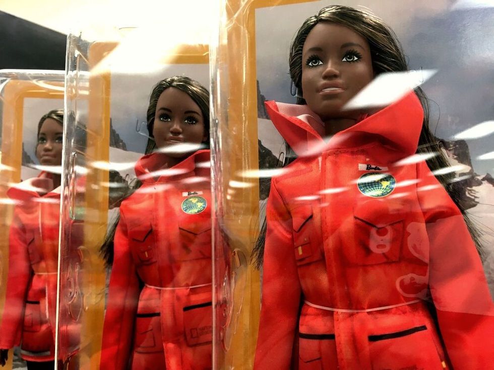 Black woman marine biologist: contemporary girls' toys insipred by National Geographic.