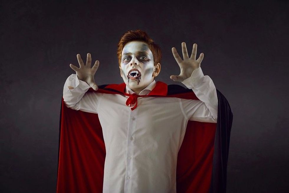 Bloodthirsty vampire kid wants to bite you.