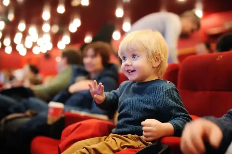 Boy at the cinema.