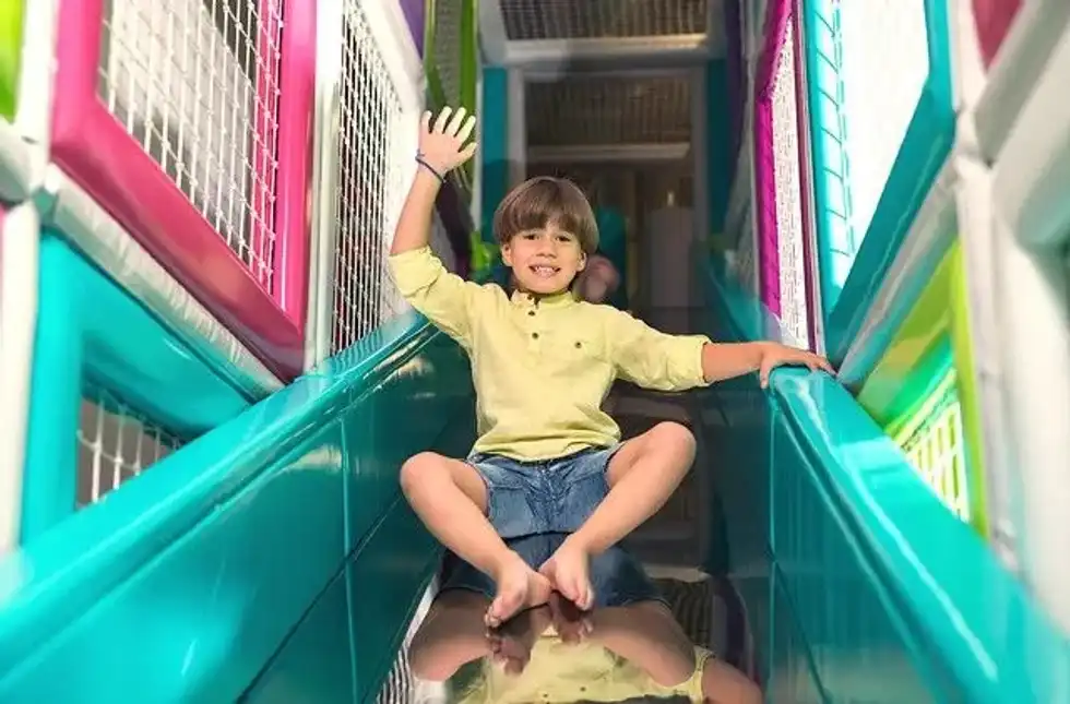 Boy enjoying soft play area