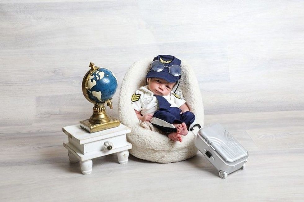 Boy in cute pilot costume