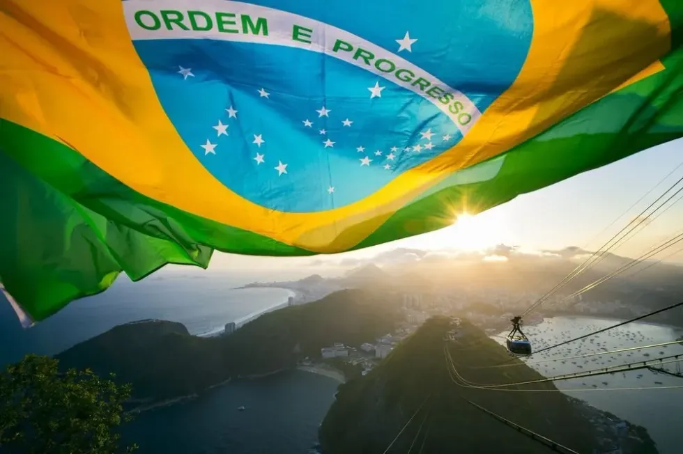 Brazil flag waving in the foreground
