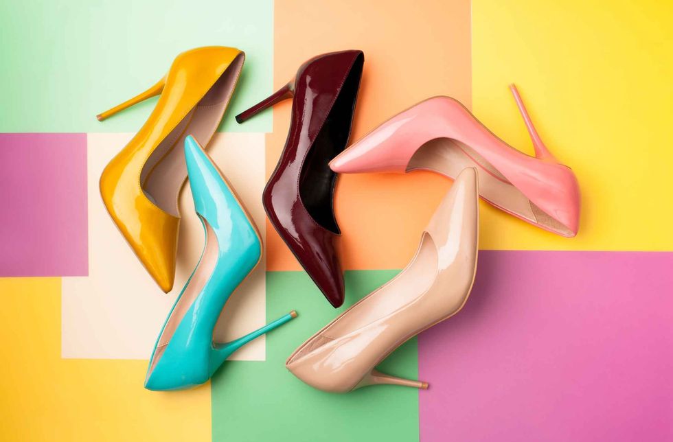 Bright colored women's shoes on a solid background.