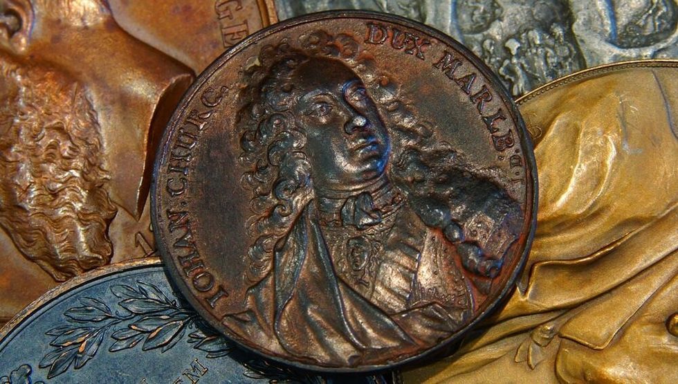 British aristocracy: General John Churchill 1st Duke of Marlborough bronze medal against the background of European medals of the 18-19th century.