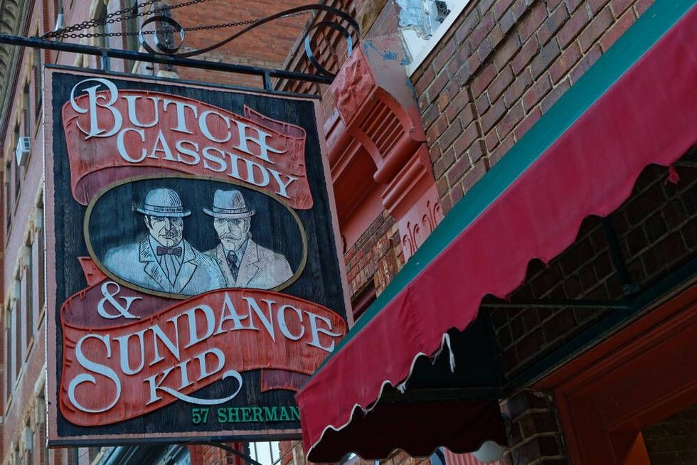 Butch Cassidy and the Sundance Kid hanging board sign.