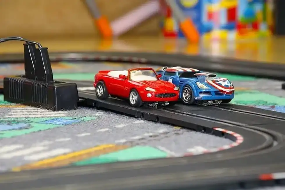 Cars on a race track inspiring car puns