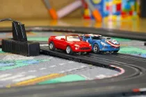 Cars on a race track inspiring car puns