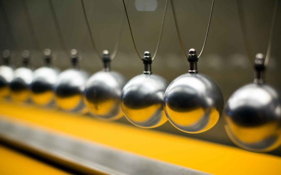 Cartesian impulse conservation law experiment metallic balls