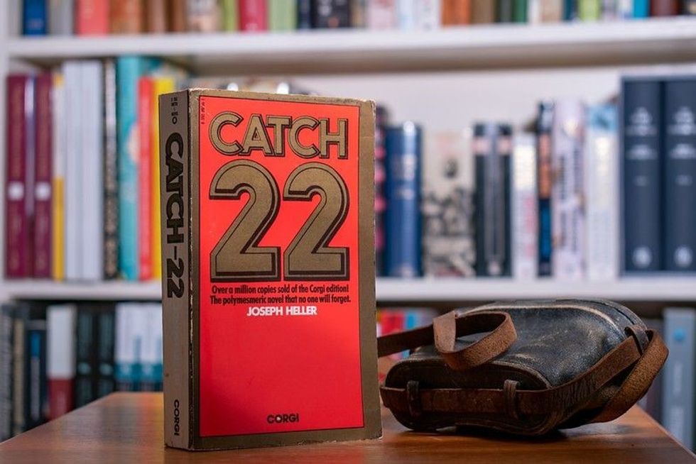 Catch 22 book by Joseph Heller.
