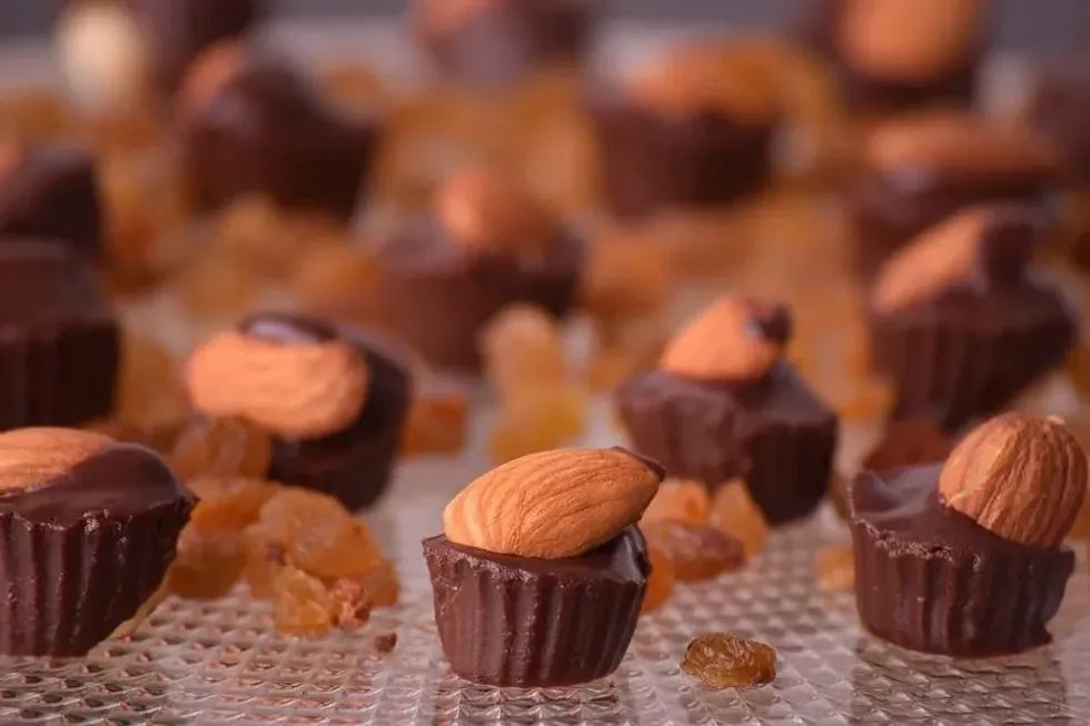 Celebrate this National Chocolate with Almonds Day by having almonds and cocoa.